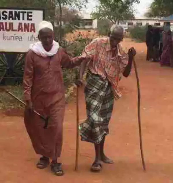 Photo Of A 100-Yr-Old Man Being Led To The Polling Unit By His 70-Yr-Old Son In Kenya Went Viral